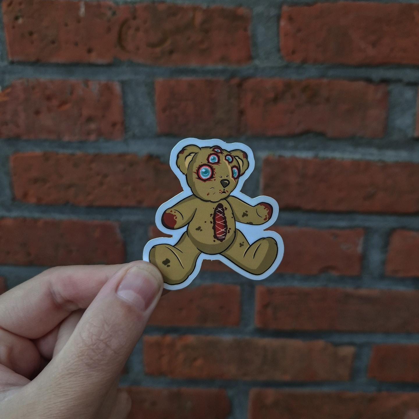 Scary creepy vinyl sticker, horror disturbing label, dark mysterious teddy bear, Gothic decoration, eerie monster haunted illustration