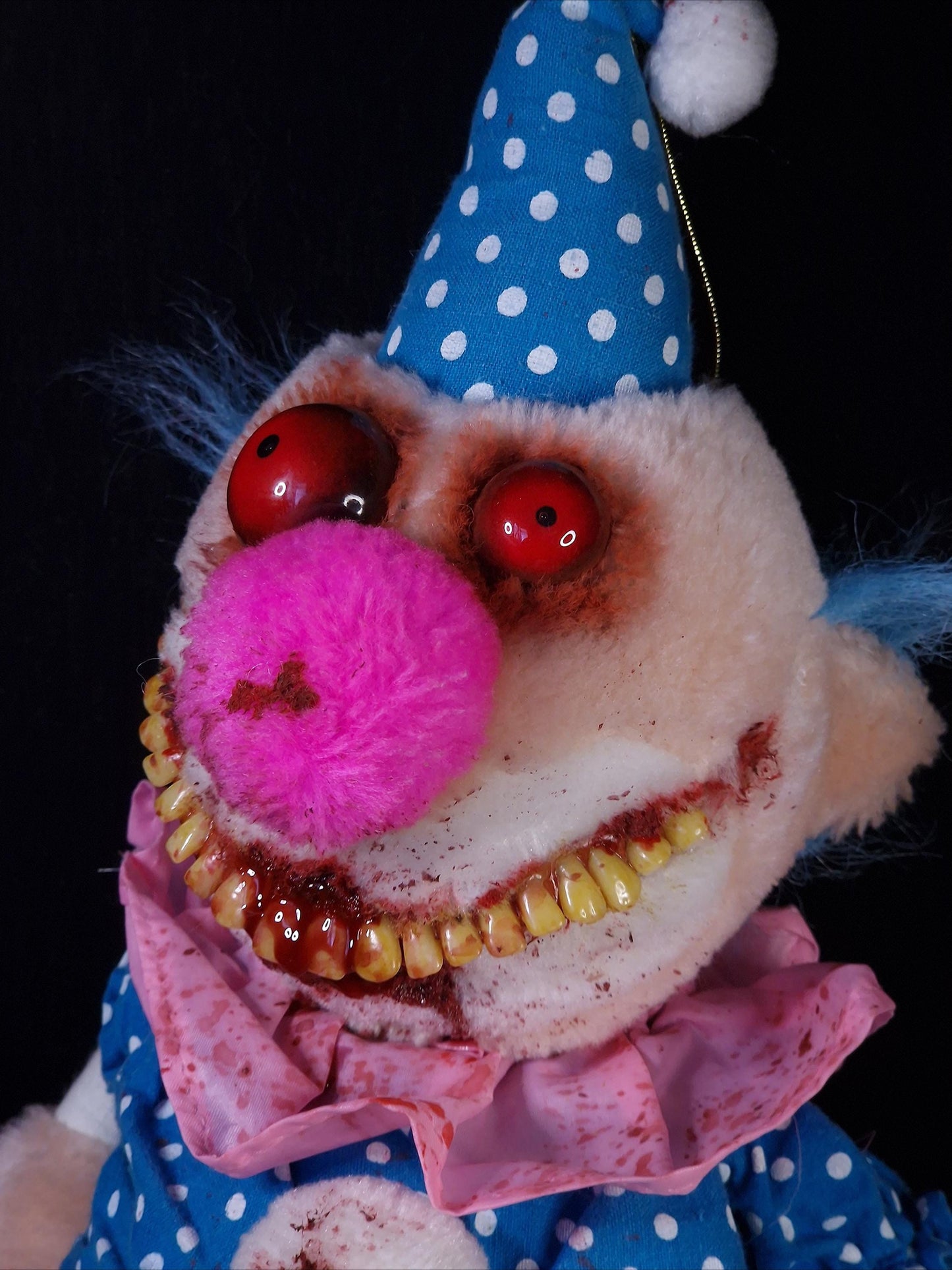 Clown plushie with blue hat