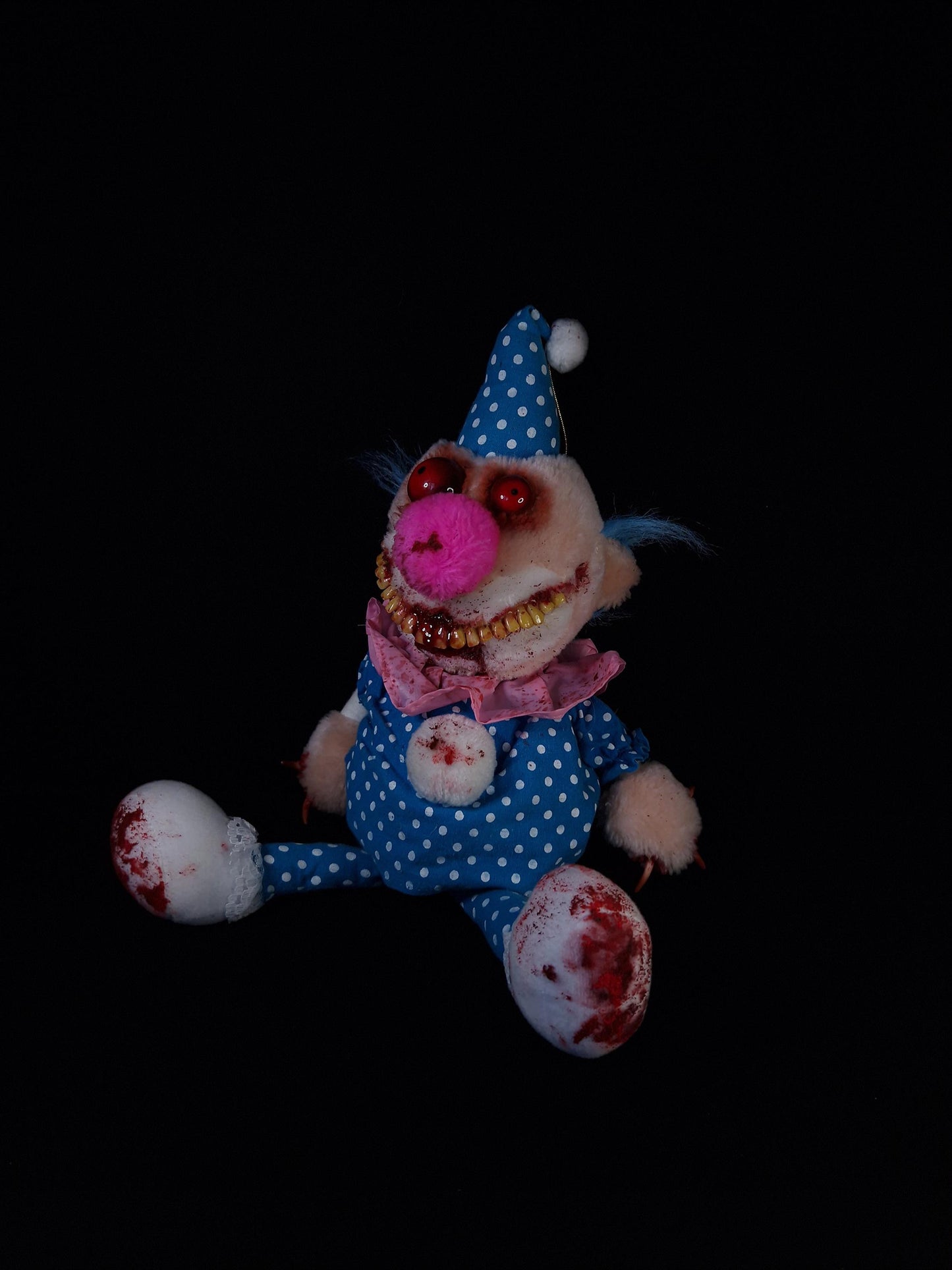 Clown plushie with blue hat