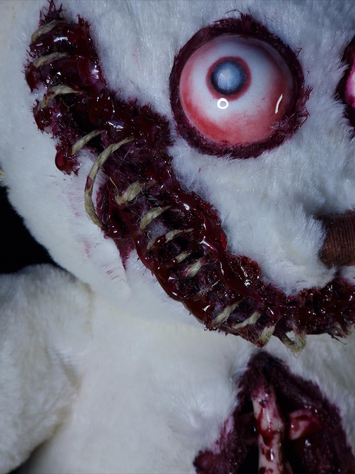 Bloody sewed mouth teddy bear