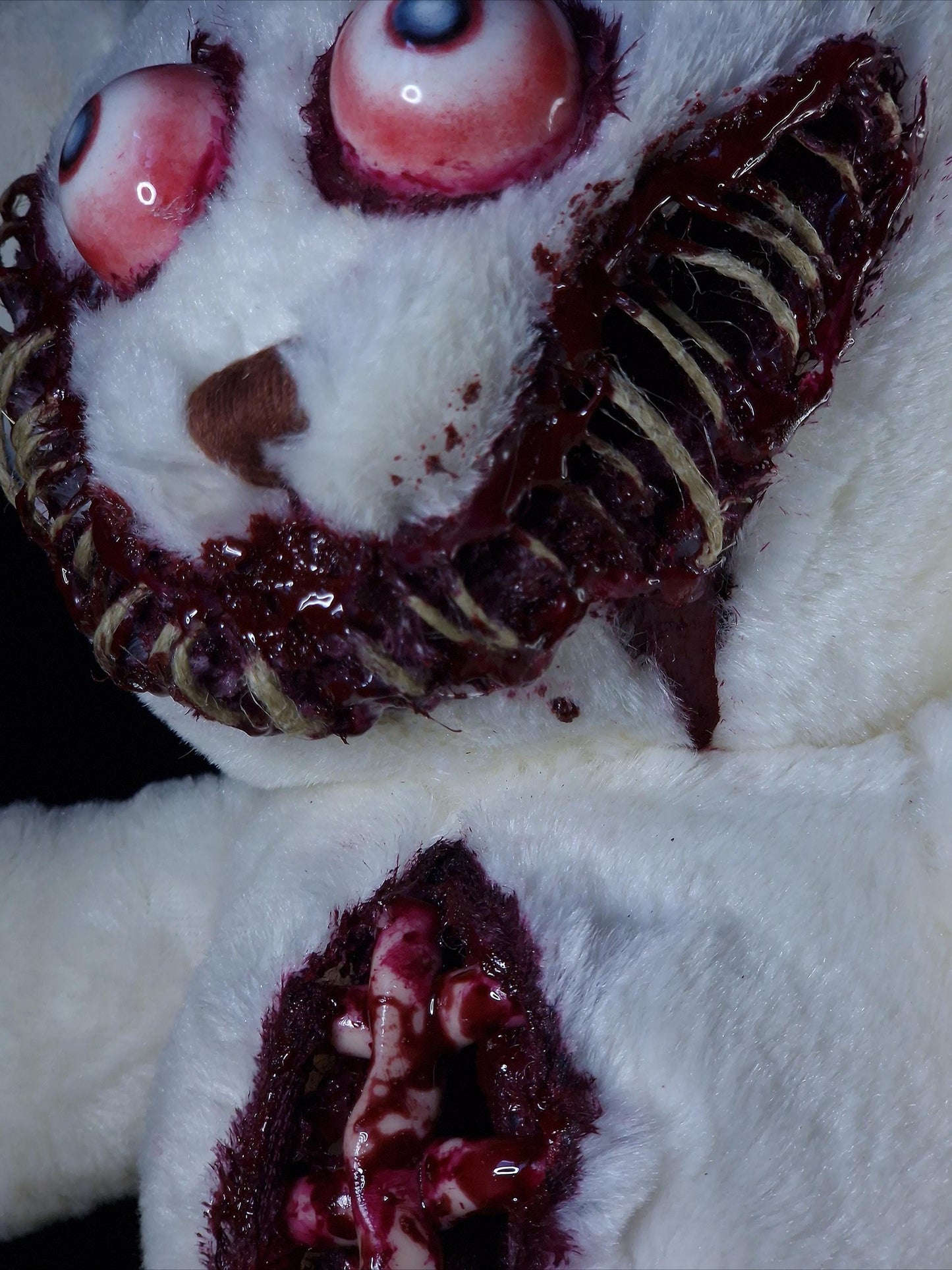 Bloody sewed mouth teddy bear