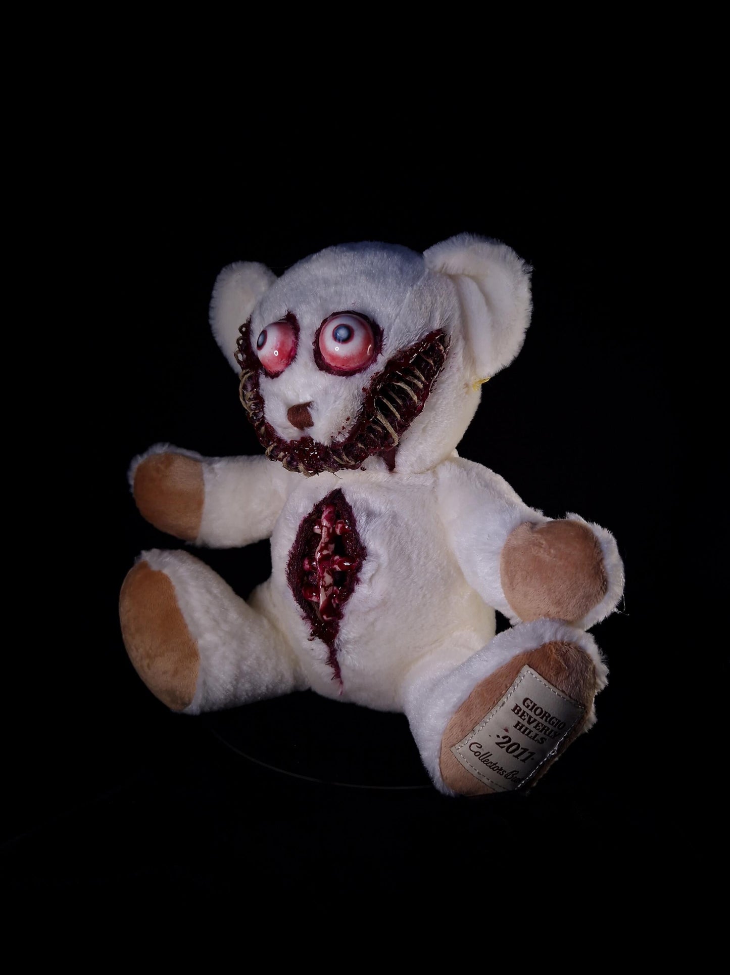 Bloody sewed mouth teddy bear