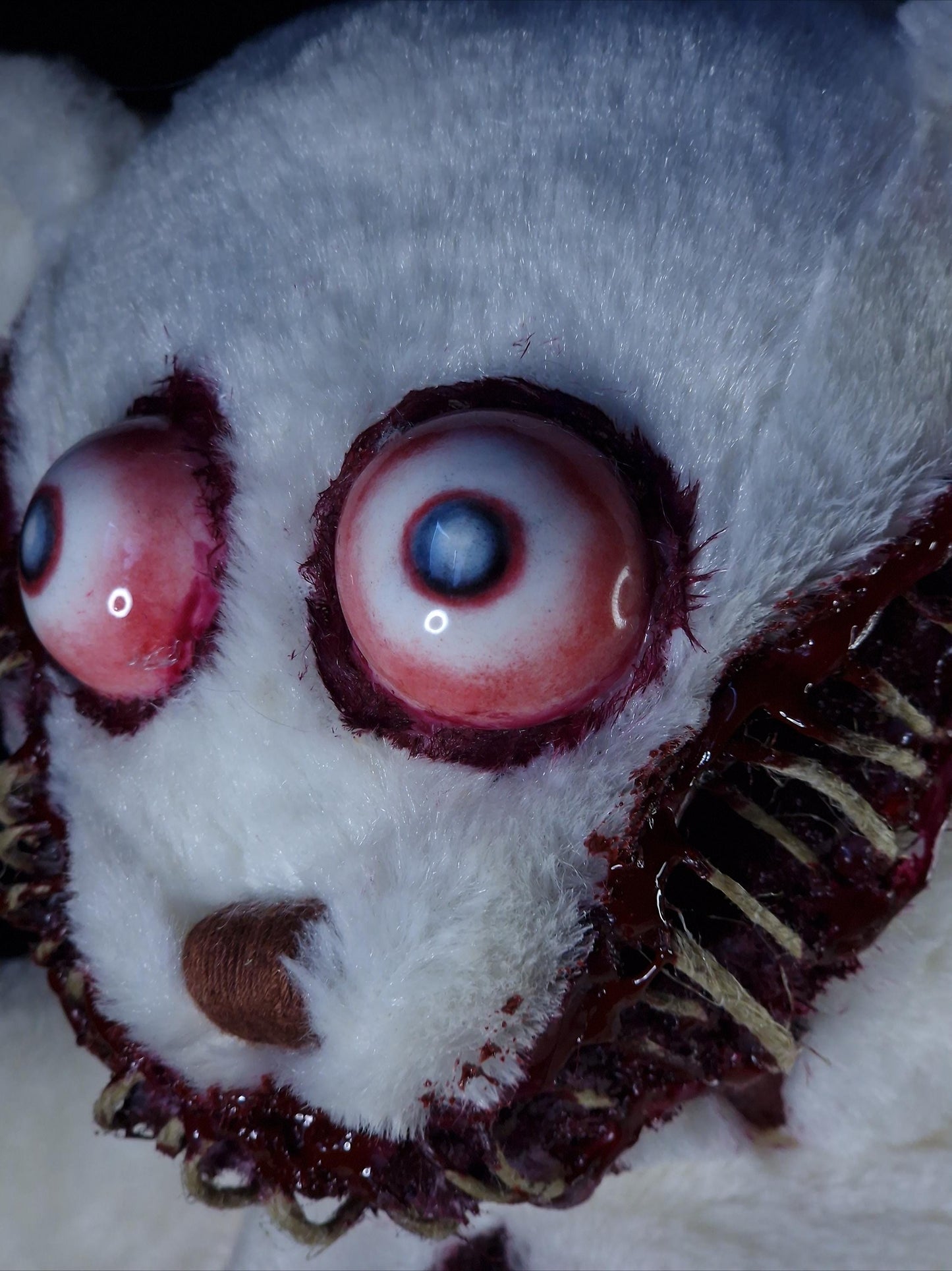 Bloody sewed mouth teddy bear