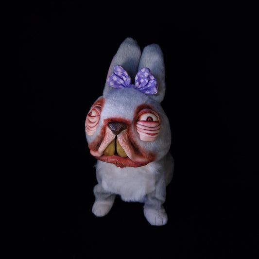 Ugly bunny plushie with weird eyes and big teeth 