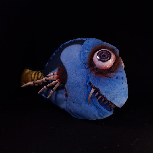 Dory with big purple eyes with blood, shark teeth and bone structure Fin