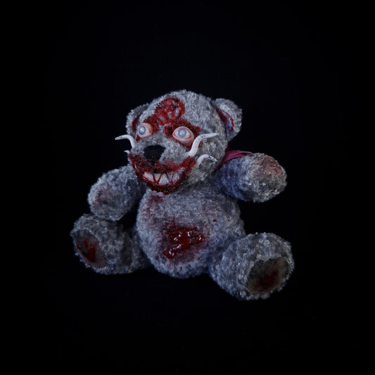 Grey reddy bear with pentagram and blind eyes 