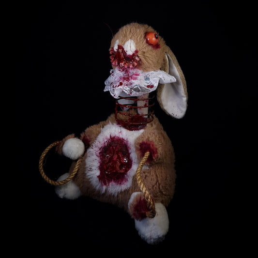 Bunny rabbit with iron spiral neck, bloody fleshy stomach, long rope arms, yellow blind eyes and creepy bloody teeth 