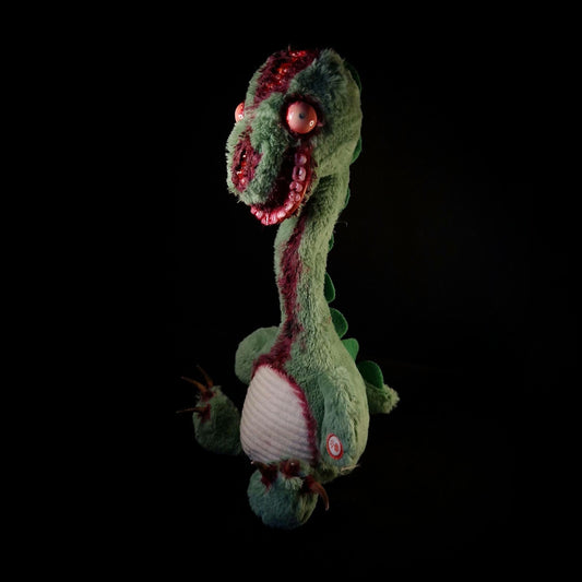 Dinosaur with long neck, big nails, bloodshot eyeballs and a bloody smile and brains